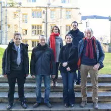 6 people who ran a workshop on the Alans in front of an Oxford College