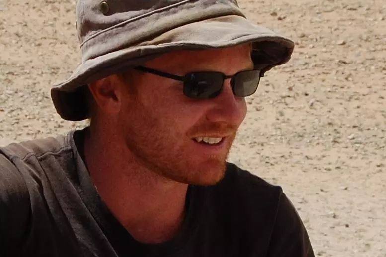 Dr Bryan K. Miller